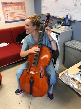 Resident playing cello